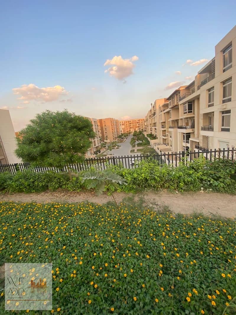 Duplex with a garden and lake view, area 161 m, with a private garden of 42 m, for sale in Taj City Compound only, with a down payment starting from 5 10