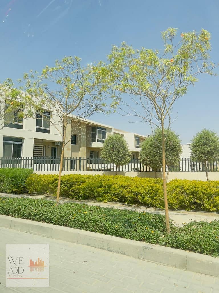 Duplex with a garden and lake view, area 161 m, with a private garden of 42 m, for sale in Taj City Compound only, with a down payment starting from 5 19