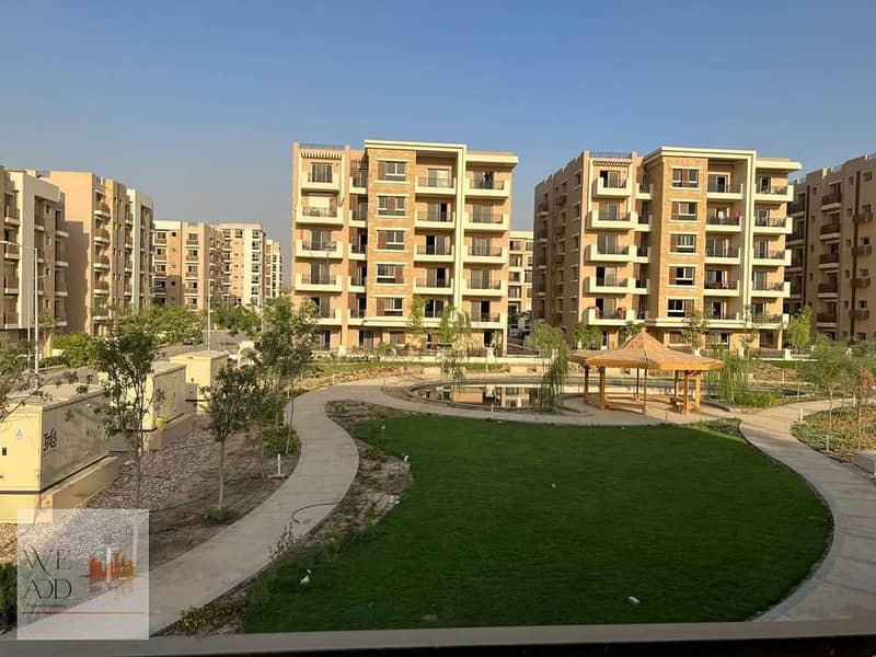 Two-room ground floor apartment with garden 115m + 60m garden for sale in Taj City Compound in front of Cairo Airport on direct view 20