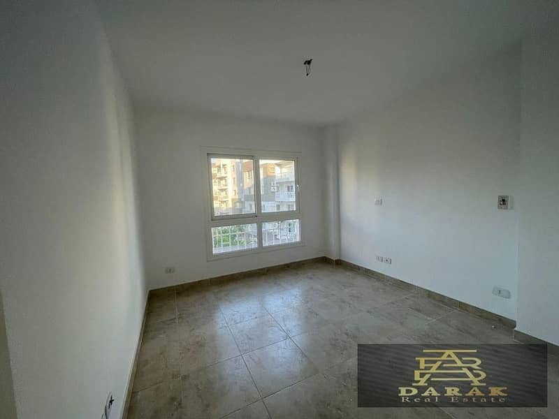 115 sqm Corner Apartment for Sale in Madinaty, B14  The apartment offers a view of a wide garden. 4