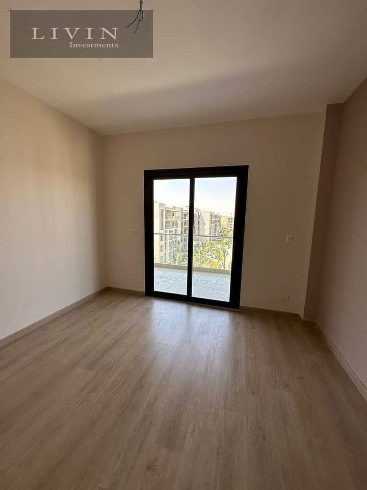 Two-bedroom apartment for sale in Telal East Extension in the Fifth Settlement in front of AUC, open view of the landscape, Telal East Compound 3