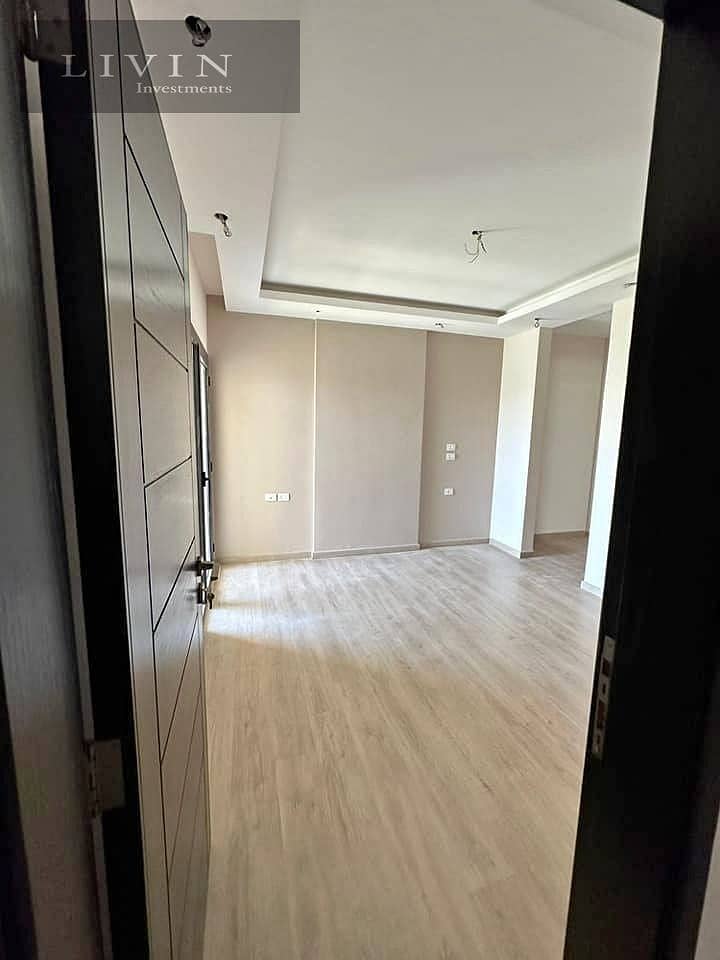 Two-bedroom apartment for sale in Telal East Extension in the Fifth Settlement in front of AUC, open view of the landscape, Telal East Compound 4