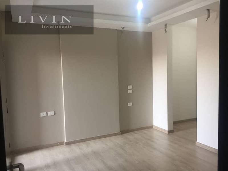 Two-bedroom apartment for sale in Telal East Extension in the Fifth Settlement in front of AUC, open view of the landscape, Telal East Compound 5