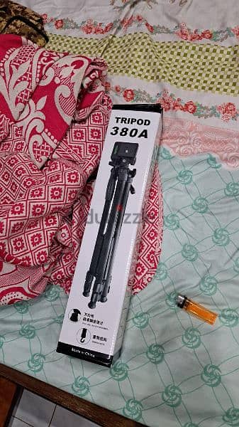 Tripod with mobile phone holder 0