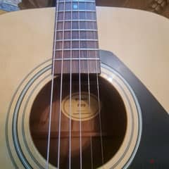 Brand new Yamaha F 310 Acoustic guitar with new strings