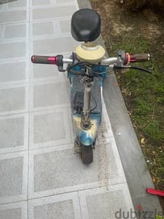 kids scooter only used few times- need service from not using /parking