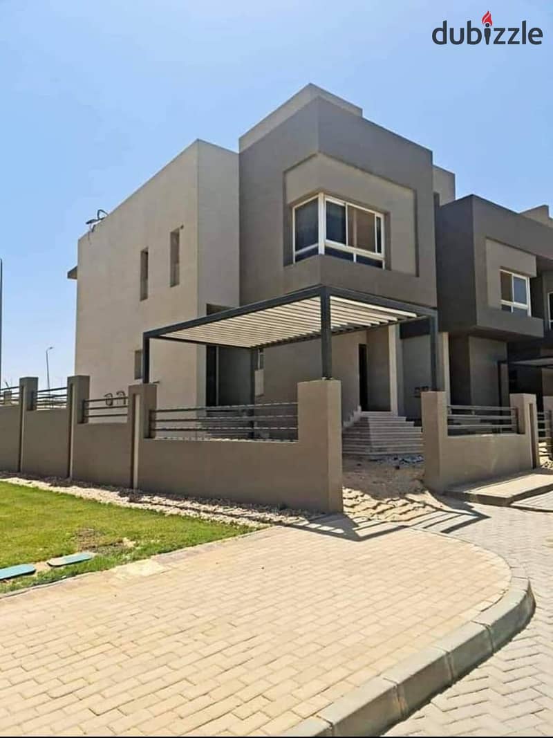 View and receive immediately a twin villa with a landscape view in Old Sheikh Zayed, next to Karma 4, in installments 7