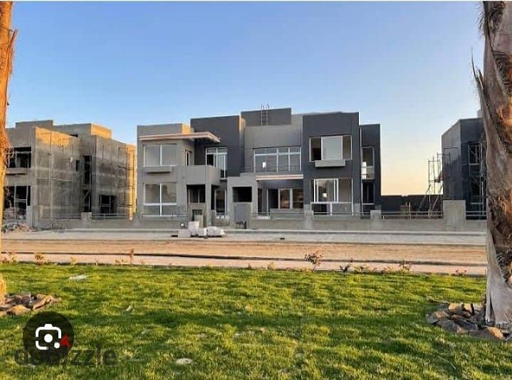 Resale villa for sale, immediate delivery, in Lagoon View, in the heart of Grand Heights, Sheikh Zayed, in installments 3