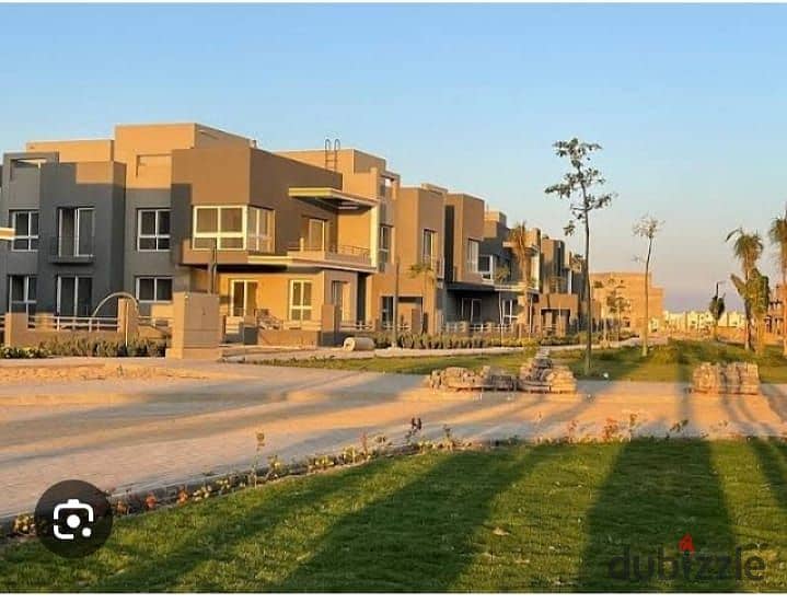 Resale villa for sale, immediate delivery, in Lagoon View, in the heart of Grand Heights, Sheikh Zayed, in installments 9