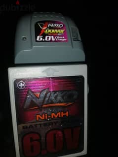 شاحن وبطارية nikko 6 volt