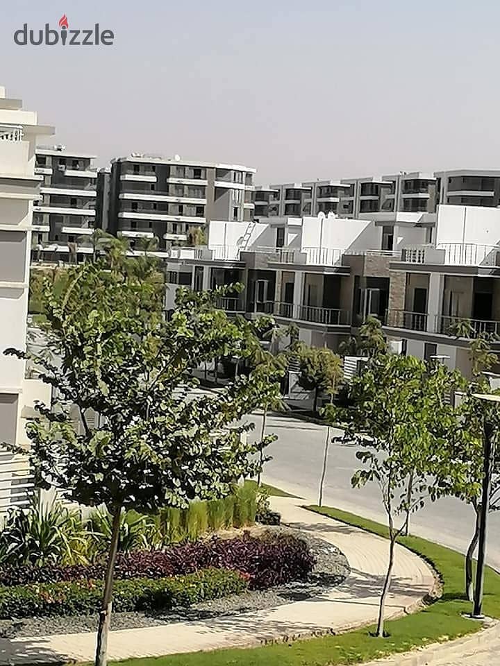 In front of the Kempinski Hotel, First Settlement, own an apartment in a garden in installments up to 8 years 9