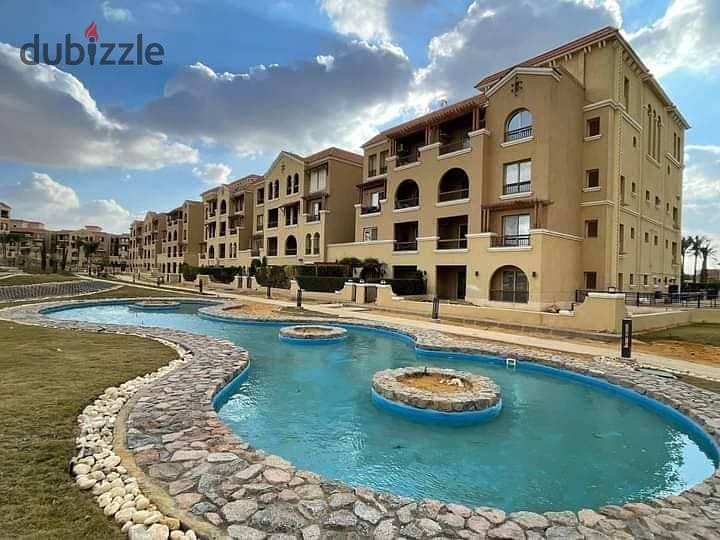 For sale in installments townhouse 292m + 334m garden in front of Madinaty 2 in Maadi View Compound 2