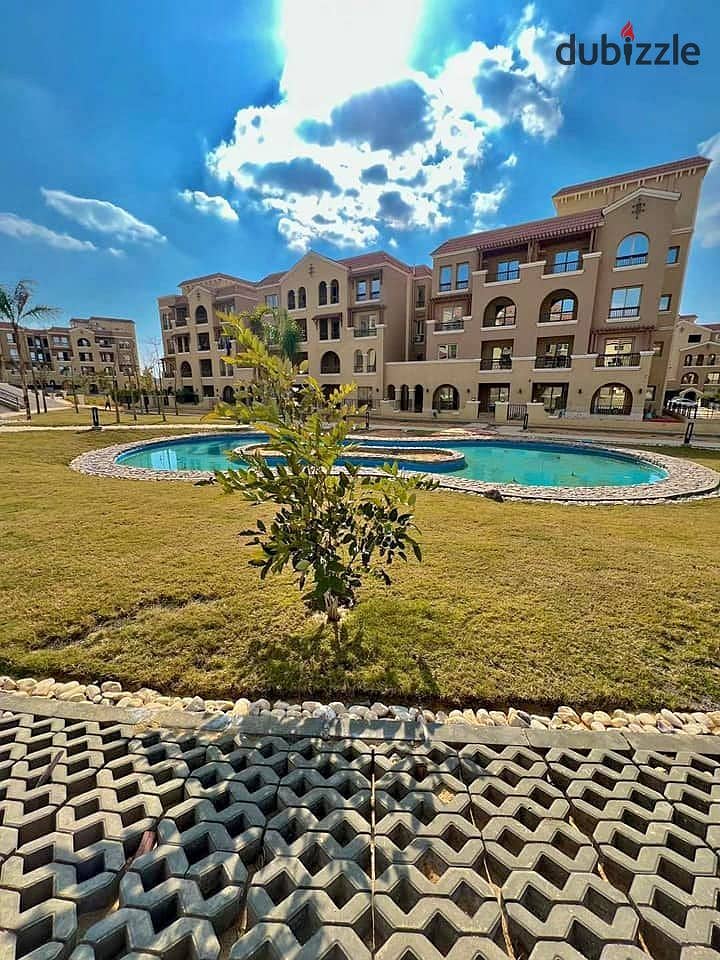 For sale in installments townhouse 292m + 334m garden in front of Madinaty 2 in Maadi View Compound 6