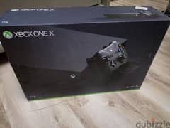 Xbox One X with box