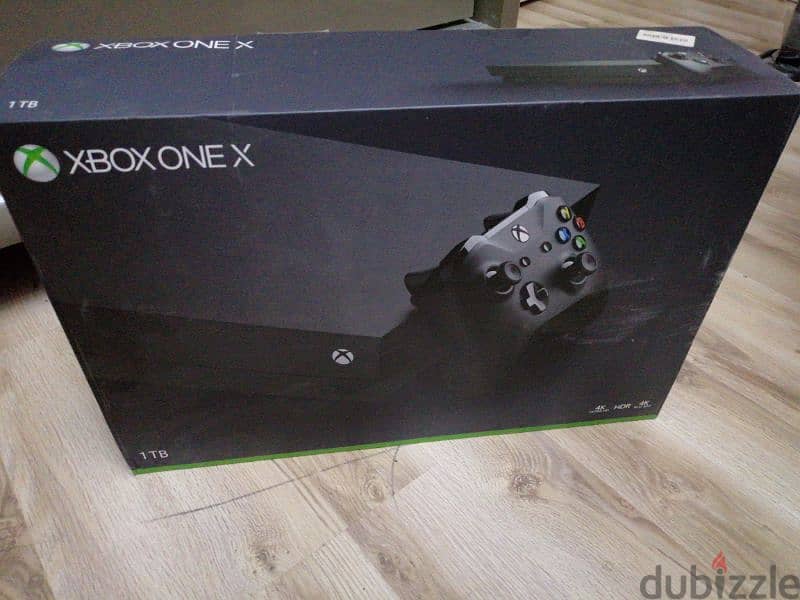 Xbox One X with box 0