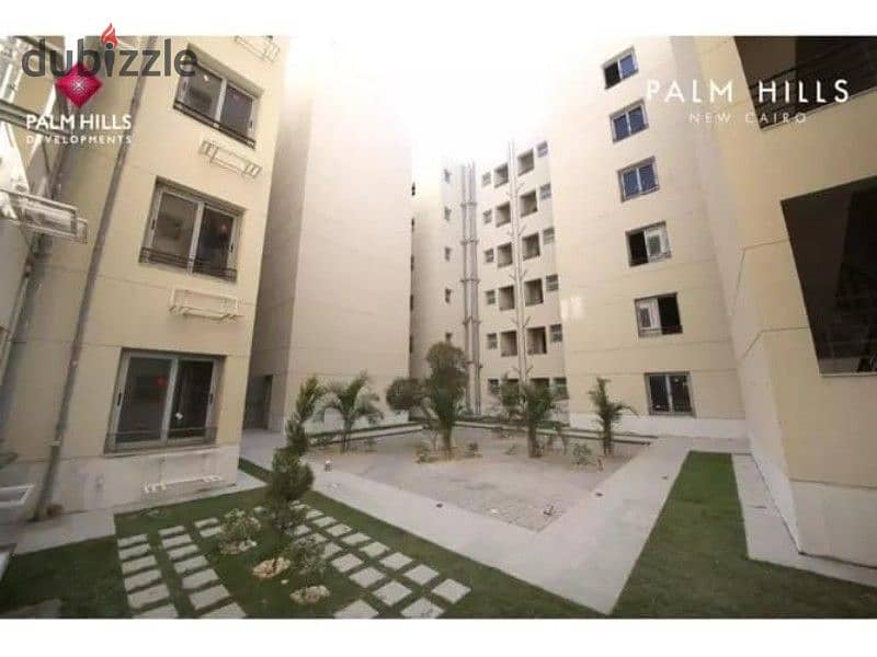 Studio with garden for sale , a prime location , with an area 70 m , in palm hills new Cairo 2