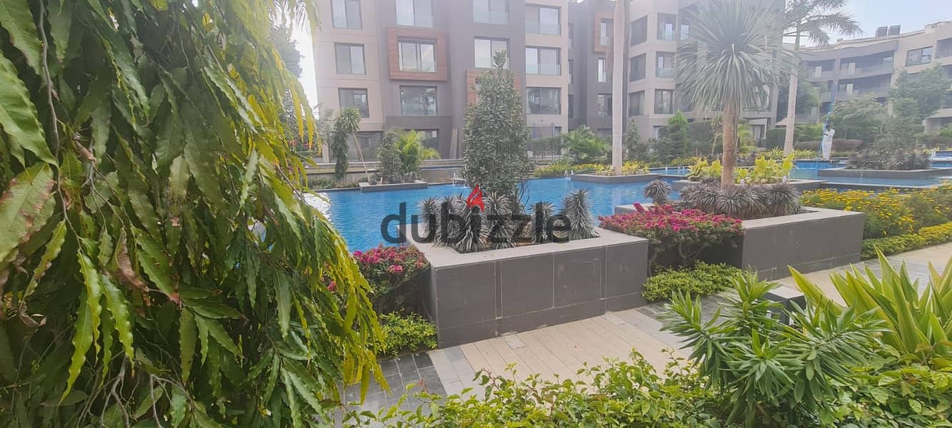 ground floor apartment 320m with garden and private swimming pool , first hand , semi furnished , landscape view 4