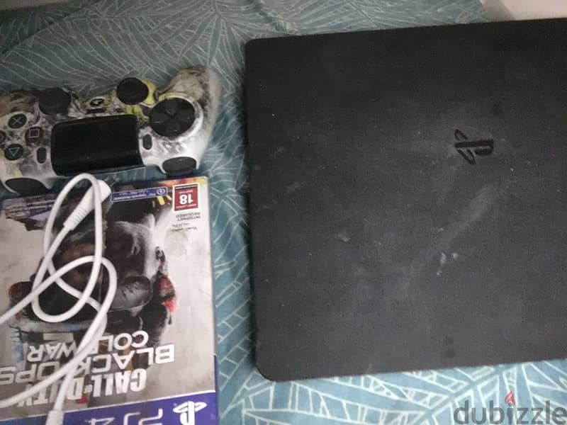 PS4 Slim 1 TB 0