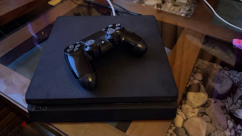 Playstation 4 Slim(1TB)-Excellent Condition with 1 Orginal controller 2