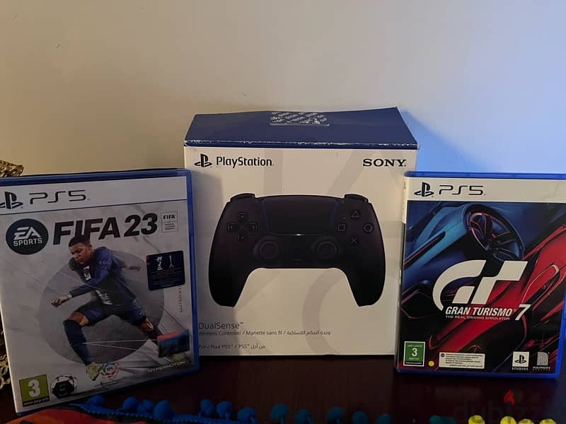 PlayStation 5 and two controllers & 2 Games 0