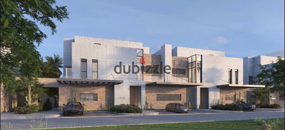 Own a 3-storey villa with a landscape view in installments, prime location, in Sheikh Zayed, in VAHA AL KARMA 0