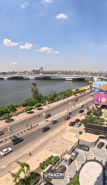 Directly on the Nile Corniche, a hotel apartment for sale with a down payment of 7.5 million in Maadi 4