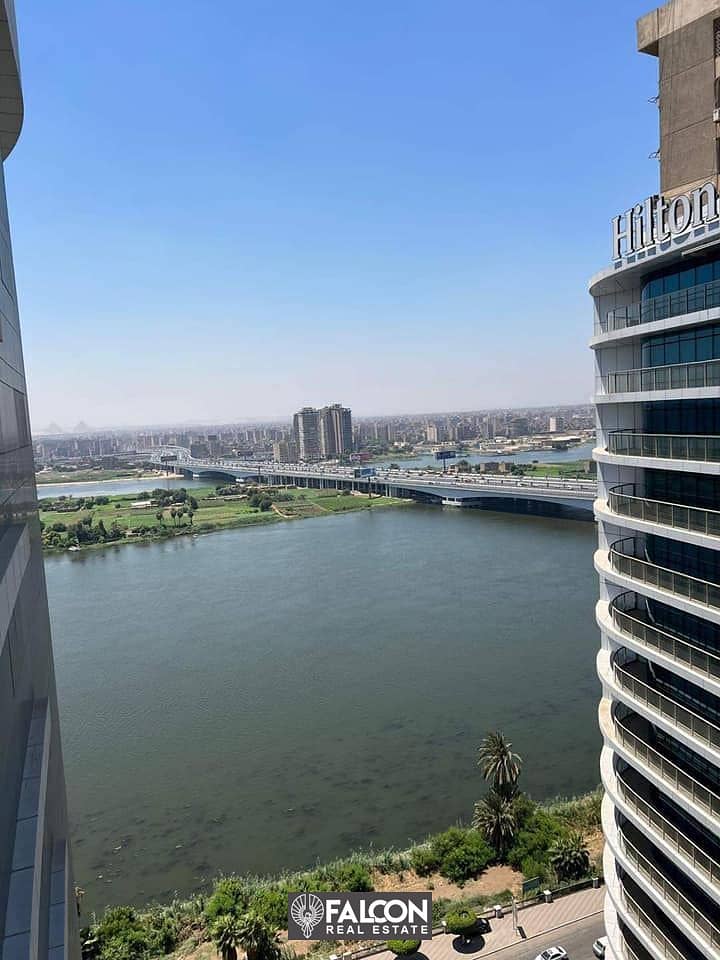 Directly on the Nile Corniche, a hotel apartment for sale with a down payment of 7.5 million in Maadi 5