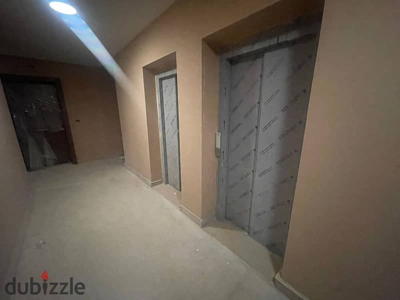 For sale, an apartment of 149 m with installments resale Village West Compound, ground floor 3 bedrooms, Sheikh Zayed, fu 8