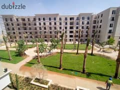 For sale apartment with finishing, installments, Village west Sheikh Zayed