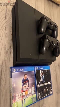 PS4 1 TB with two controllers and 2 games