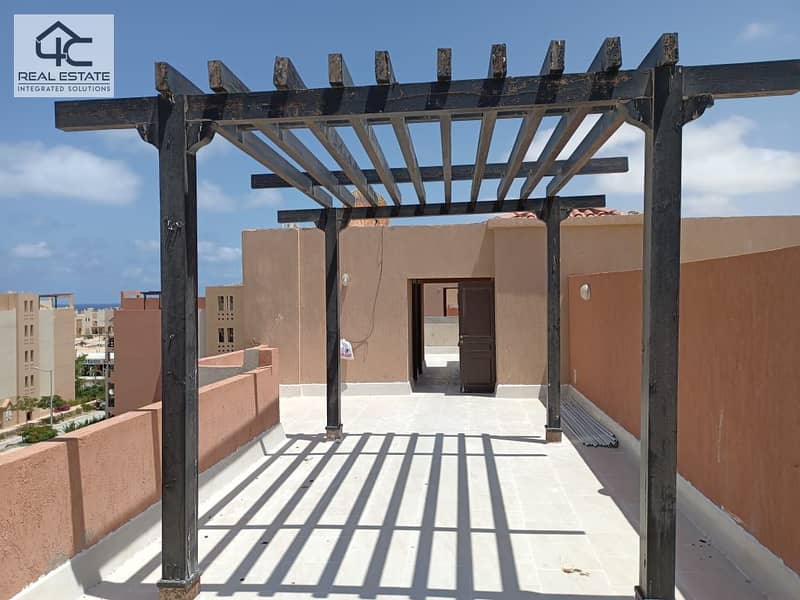 For sale in Emirates Heights, a chalet on a terrace overlooking the sea, 100 square meters, including furniture and appliances, at a special price, th 12