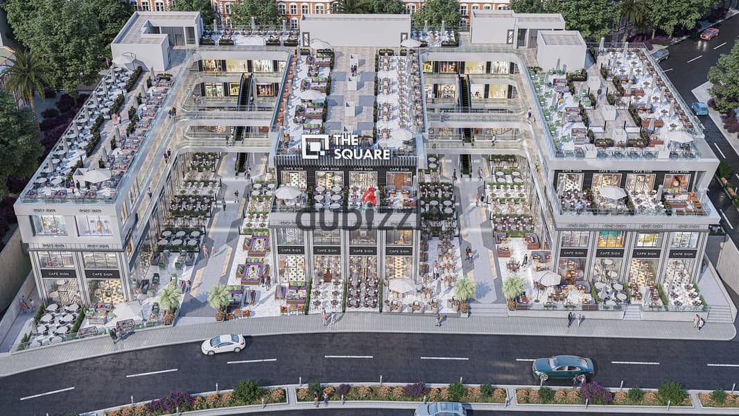 A shop for sale, ground floor with an outdoor area, suitable for a restaurant, cafe, or any activity, in the strongest mall in Shorouk, THE SQUAR, 13