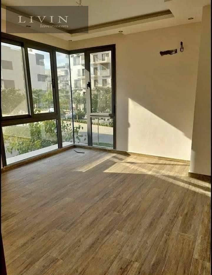 Half price apartment for sale, area 156 m, 3 rooms, landscape view, in Taj City Compound, on Suez Road, in front of Cairo International Airport 2