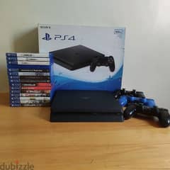 PlayStation 4 slim with 15 games and 3 controllers