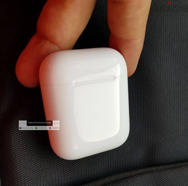 Airpods 2 generation  كيس الشحن فقط بدون سماعات بدون خدش واحد بتلمع 0