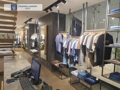 For investment, 160 sqm Retail for sale in Mohandeseen, leased for 9 years to a known clothing brand with a high monthly return  and annual increase 0