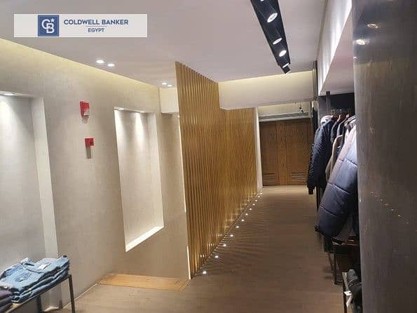 For investment, 160 sqm Retail for sale in Mohandeseen, leased for 9 years to a known clothing brand with a high monthly return  and annual increase 1