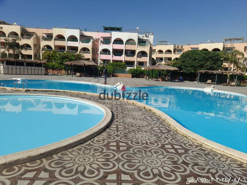 challet for sale 100m+100m roof in elsokhna Jet beach  village 13