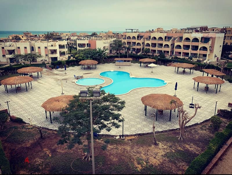 challet for sale 100m+100m roof in elsokhna Jet beach  village 21