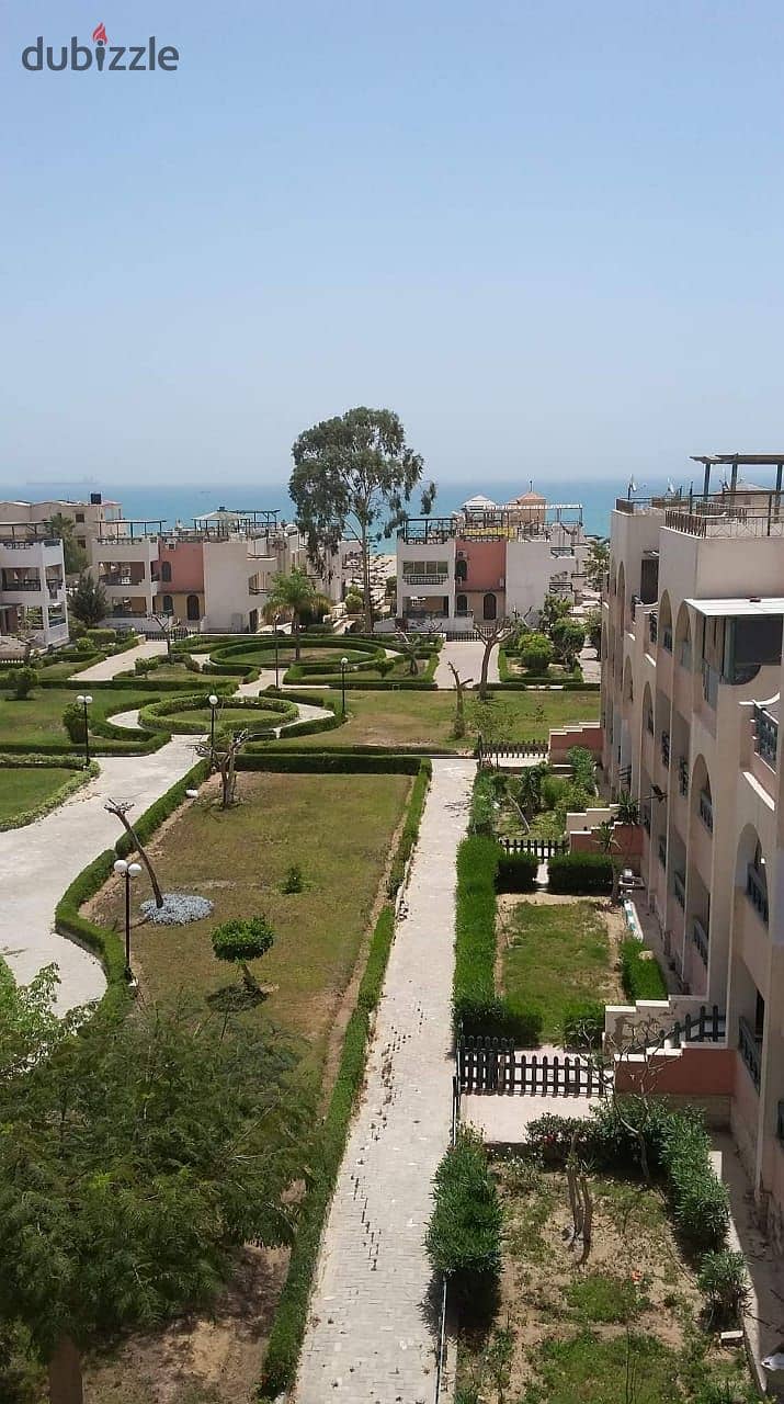 challet for sale 100m+100m roof in elsokhna Jet beach  village 38