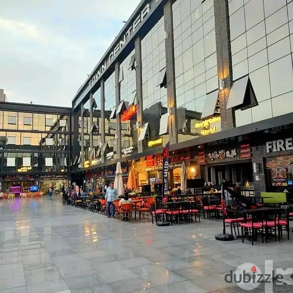 The last shop, first floor, finished, directly on the facade, in the strongest mall in Shorouk, Town Center Mall, with the highest traffic, in front o 2