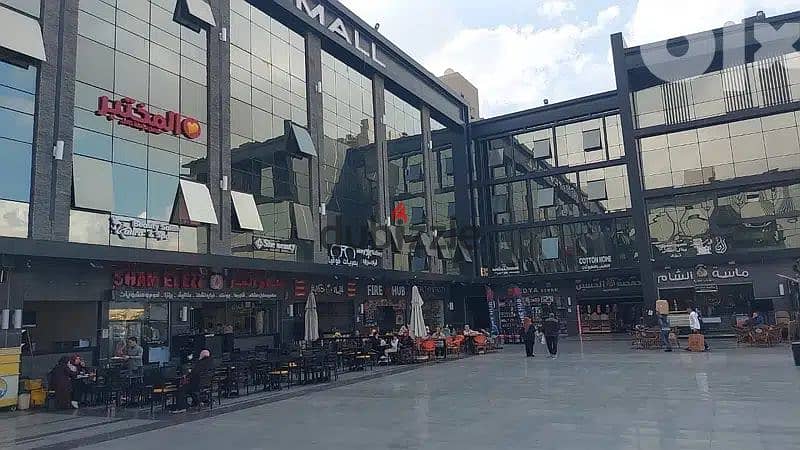 The last shop, first floor, finished, directly on the facade, in the strongest mall in Shorouk, Town Center Mall, with the highest traffic, in front o 3