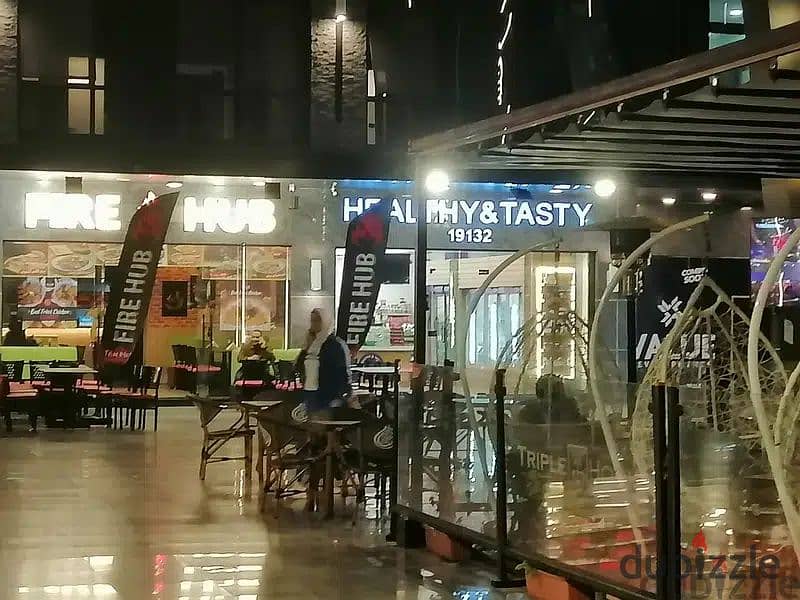 The last shop, first floor, finished, directly on the facade, in the strongest mall in Shorouk, Town Center Mall, with the highest traffic, in front o 9