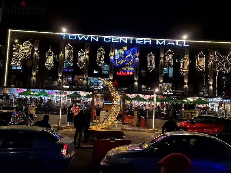 The last shop, first floor, finished, directly on the facade, in the strongest mall in Shorouk, Town Center Mall, with the highest traffic, in front o 10