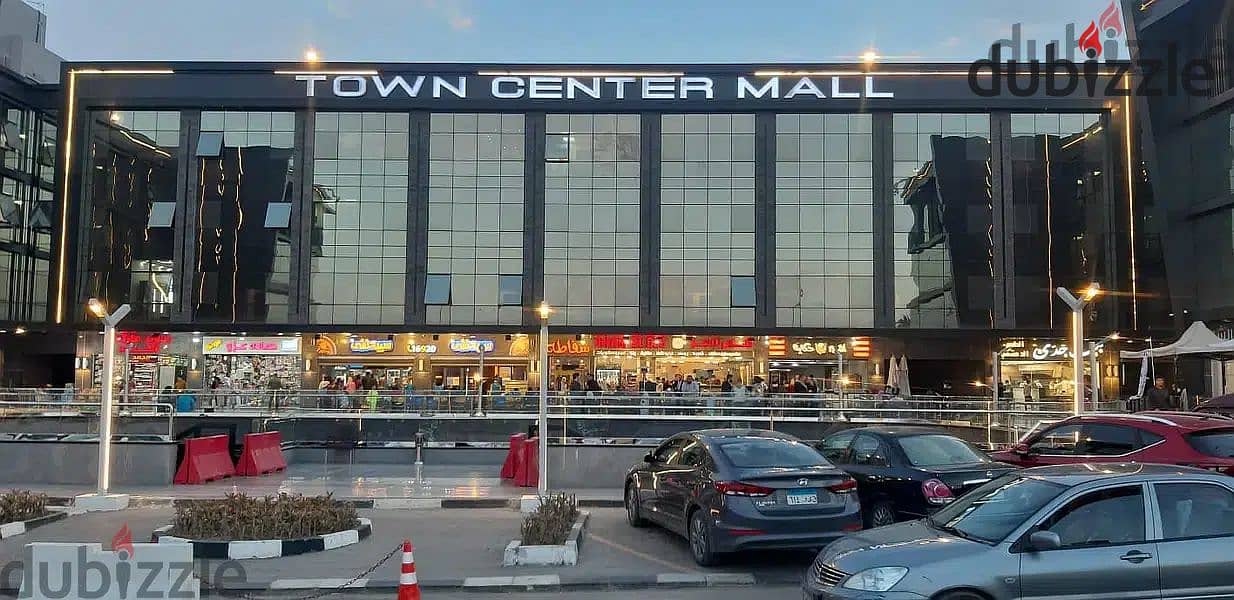 The last shop, first floor, finished, directly on the facade, in the strongest mall in Shorouk, Town Center Mall, with the highest traffic, in front o 16