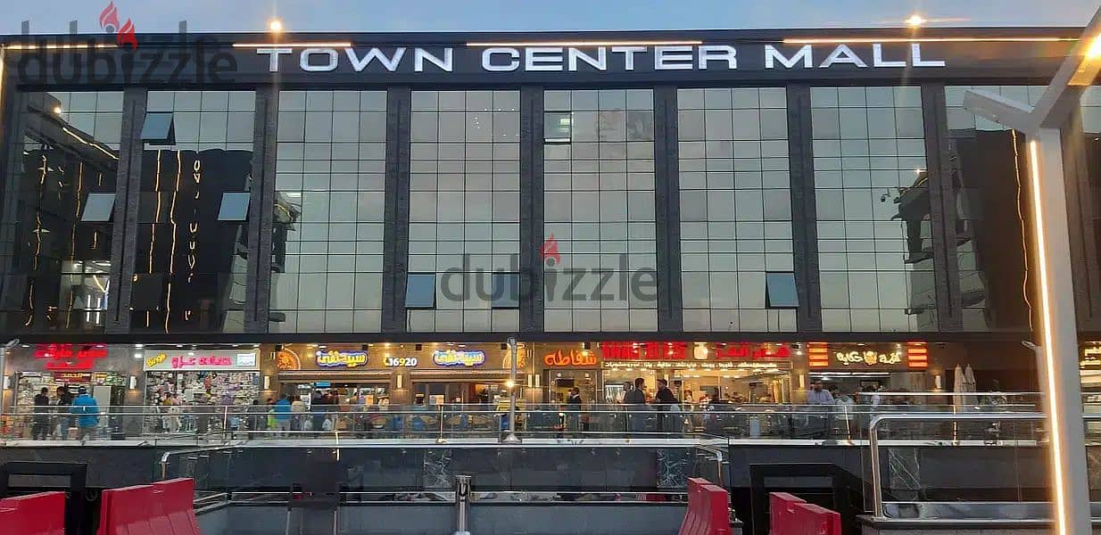 The last shop, first floor, finished, directly on the facade, in the strongest mall in Shorouk, Town Center Mall, with the highest traffic, in front o 17