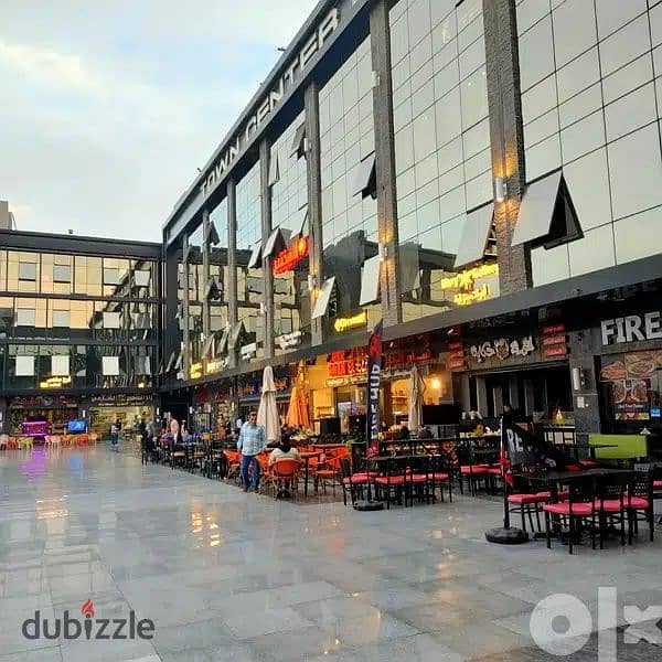 The last shop, first floor, finished, directly on the facade, in the strongest mall in Shorouk, Town Center Mall, with the highest traffic, in front o 2