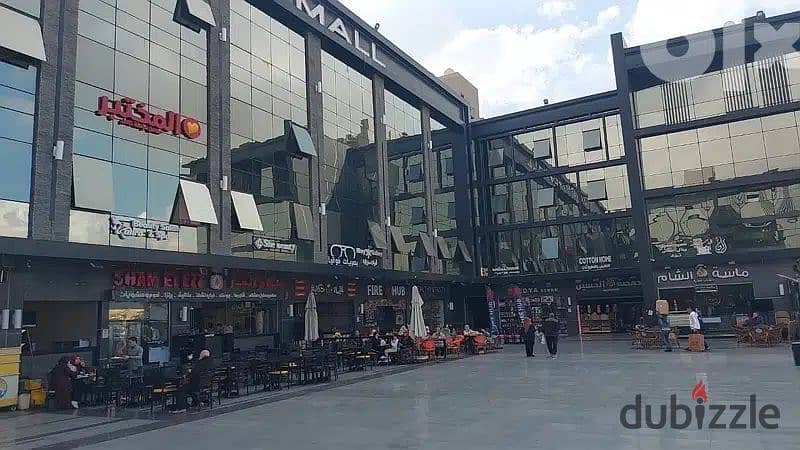 The last shop, first floor, finished, directly on the facade, in the strongest mall in Shorouk, Town Center Mall, with the highest traffic, in front o 3