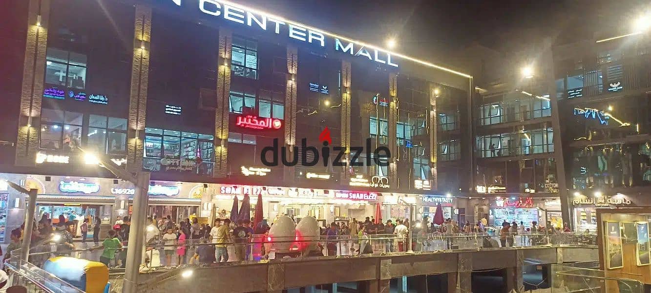 The last shop, first floor, finished, directly on the facade, in the strongest mall in Shorouk, Town Center Mall, with the highest traffic, in front o 4