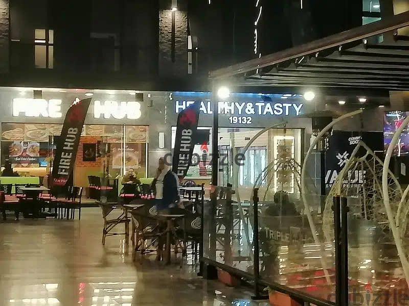 The last shop, first floor, finished, directly on the facade, in the strongest mall in Shorouk, Town Center Mall, with the highest traffic, in front o 9